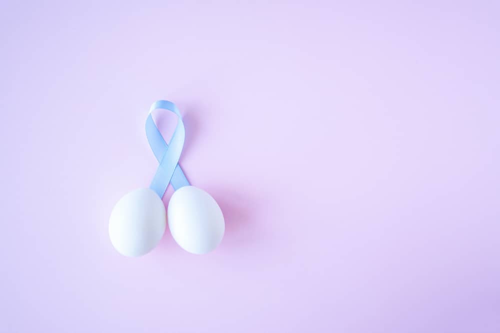 2 eggs and blue ribbon for testicular cancer