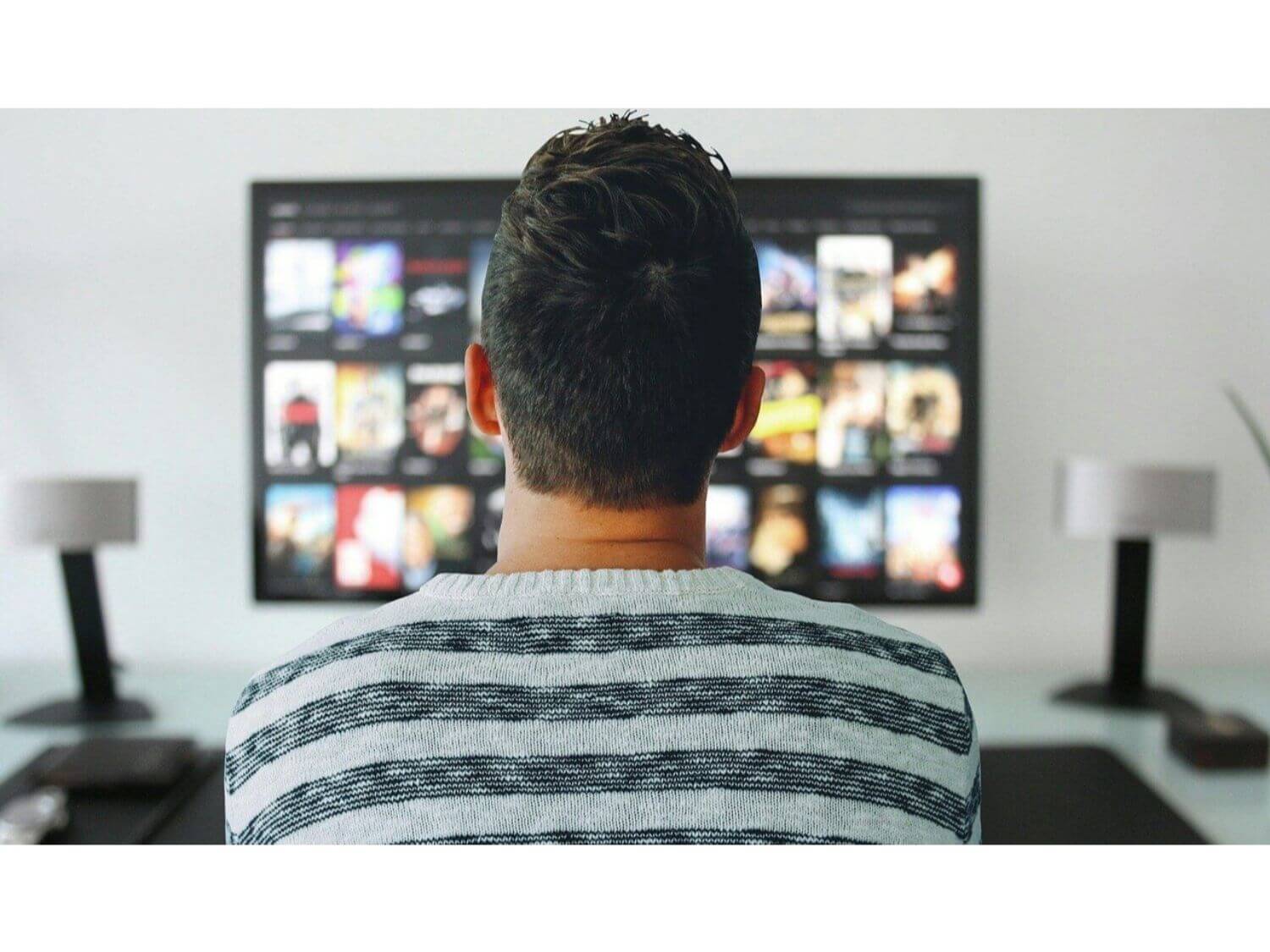 A man watching TV