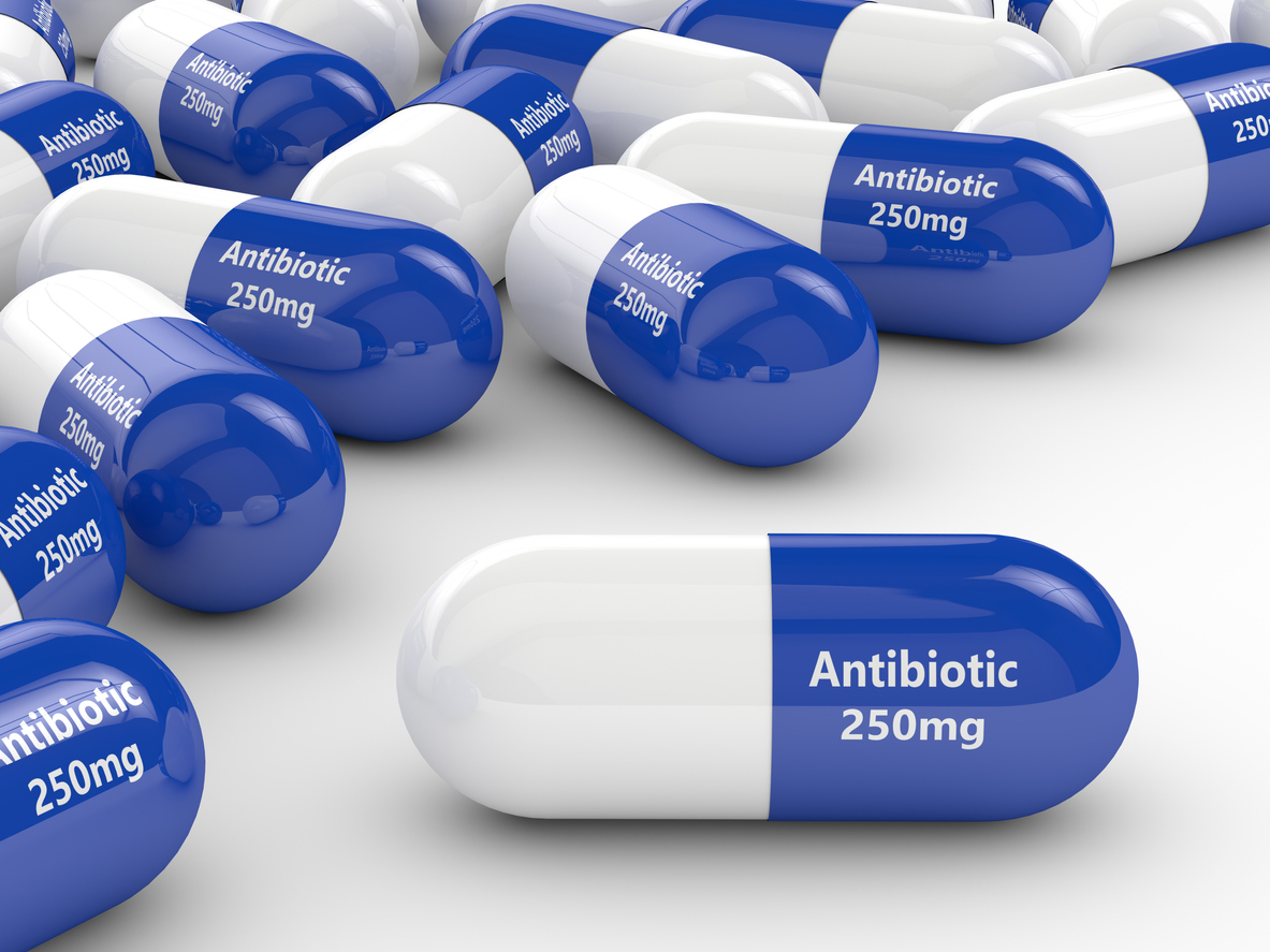 Handful of antibiotics tablets 