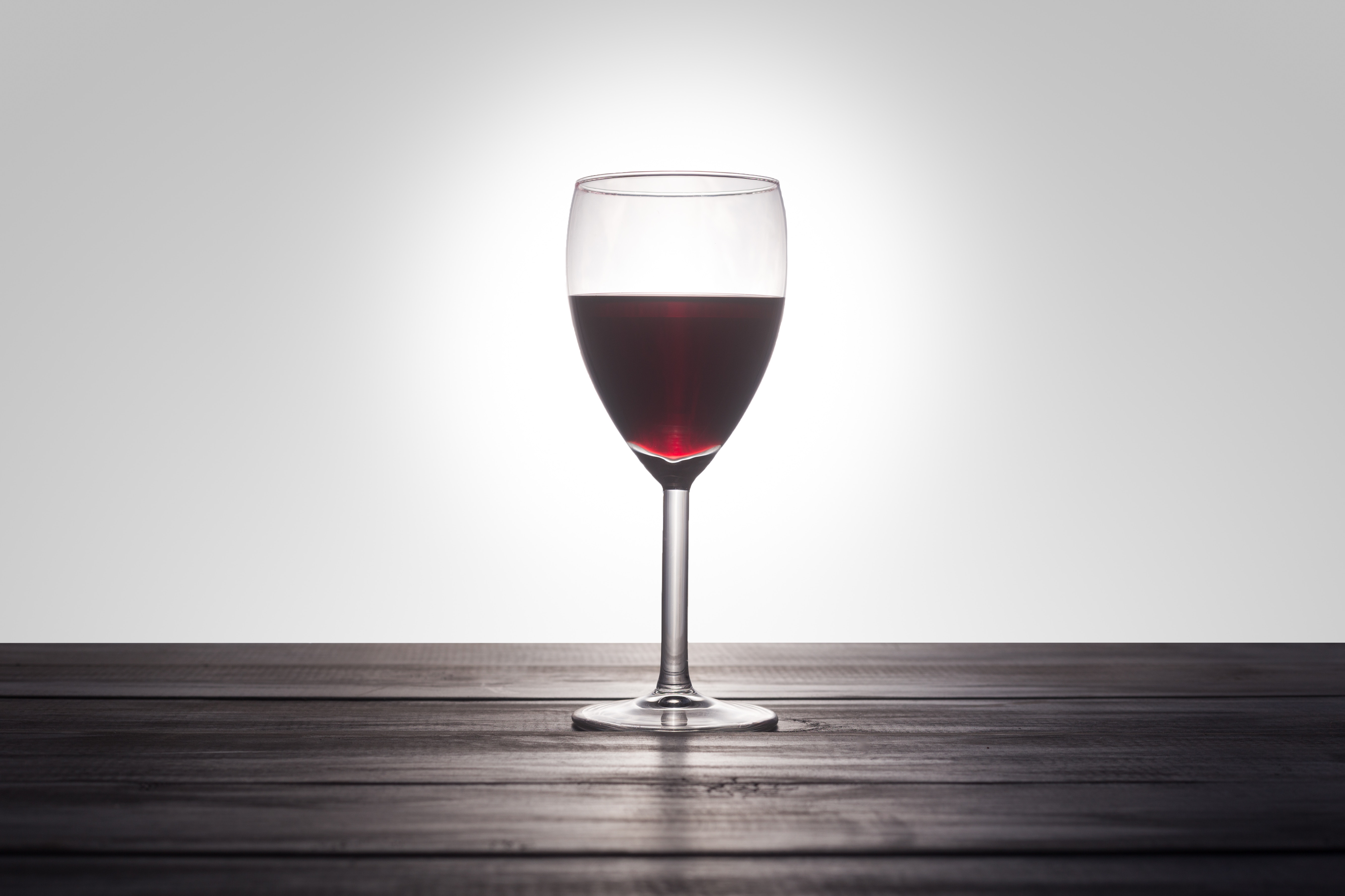 A glass of wine on the table