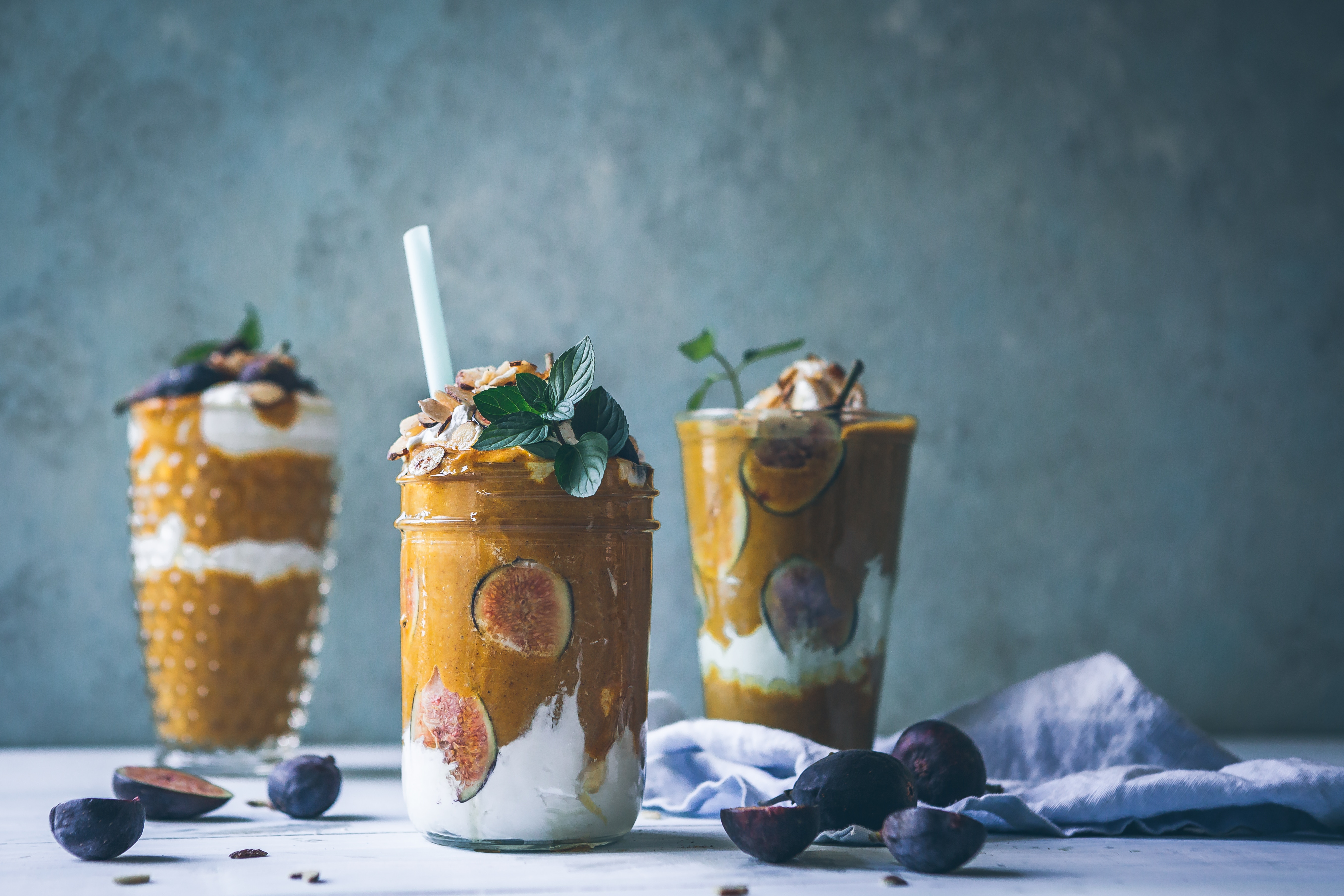 Three large smoothies with passionfruit
