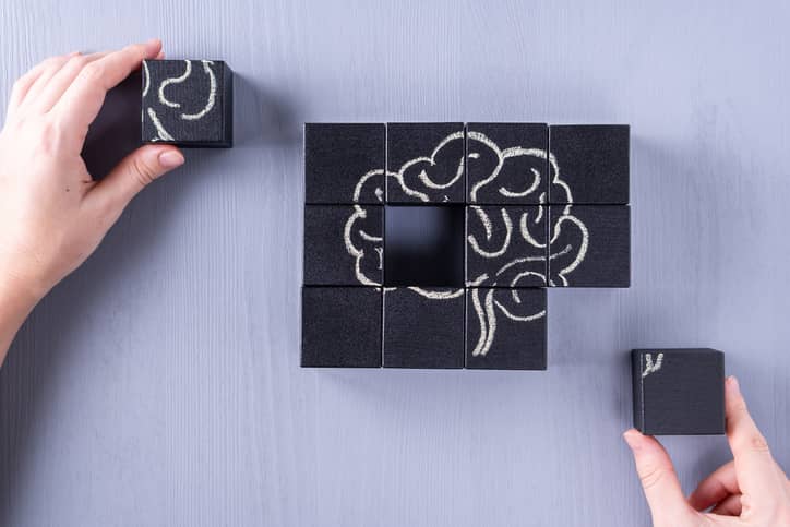 Cube puzzle of the brain representing chronic traumatic encephalopathy