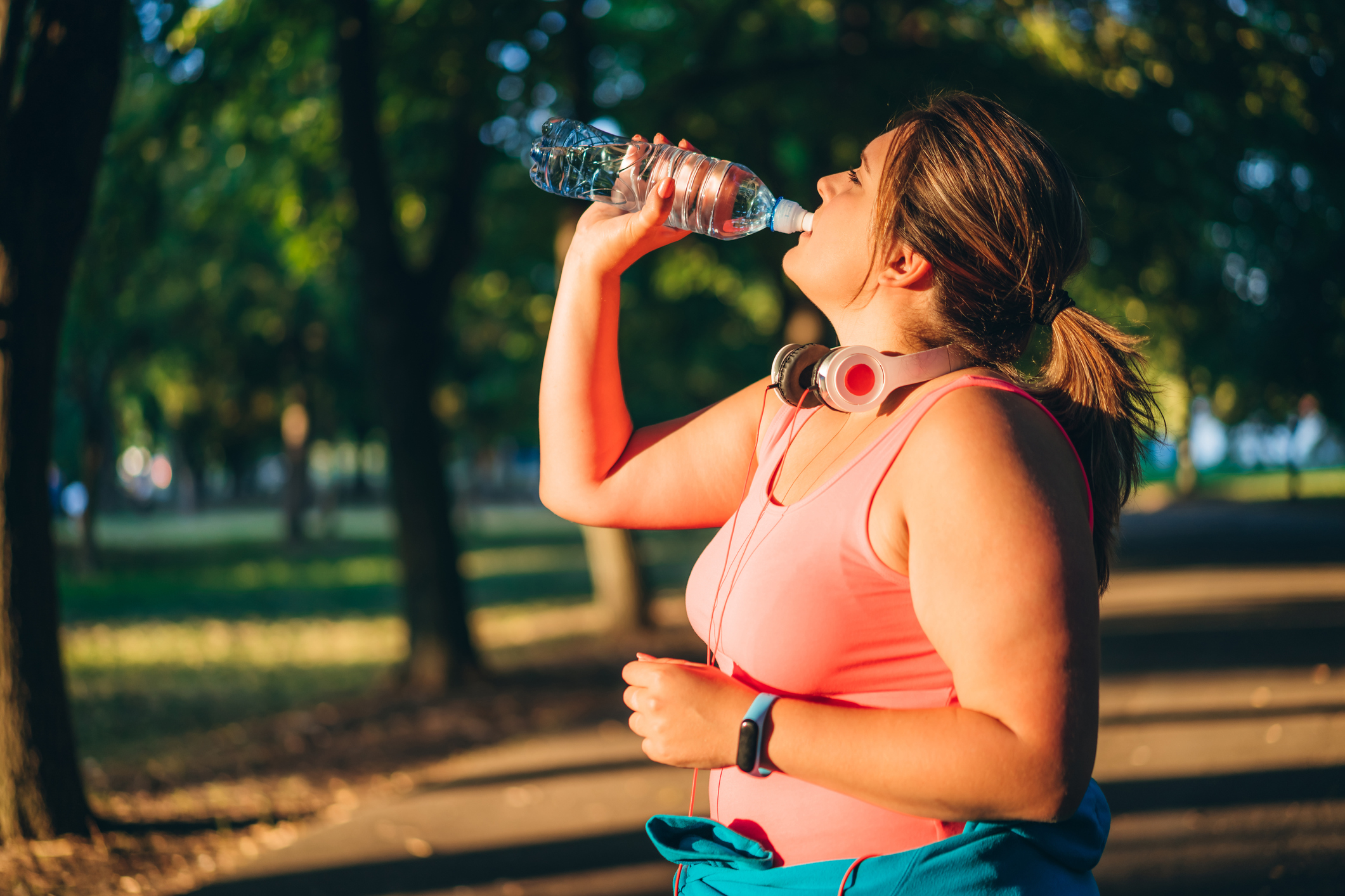 Dehydrated woman drinking water