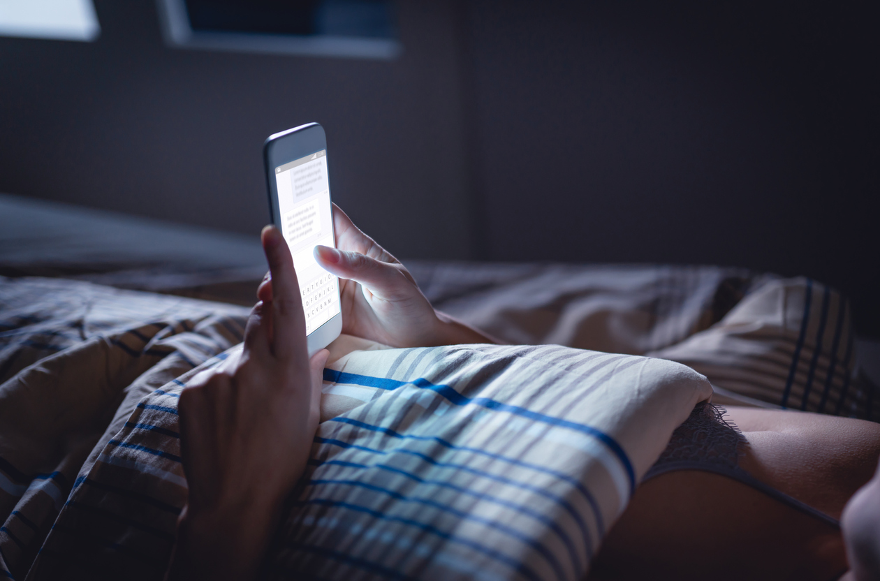 Phone bed sexting messaging