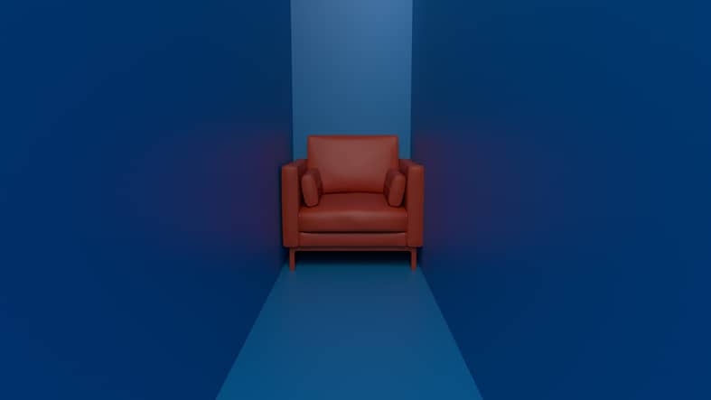 Red arm chair in a narrow blue room representing claustrophobia