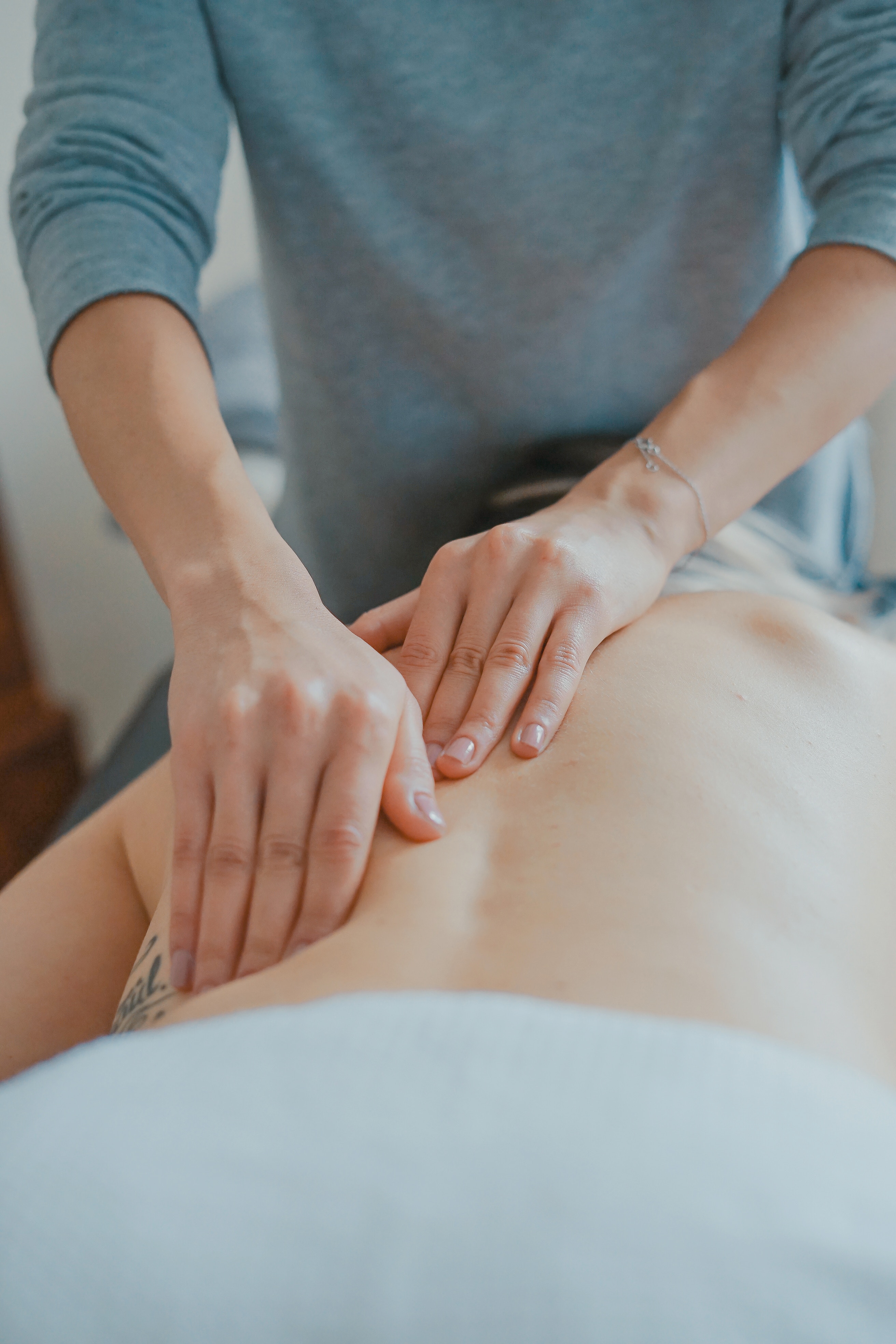 Person recieving a back massage