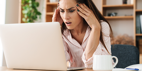 Irritated lady at computer