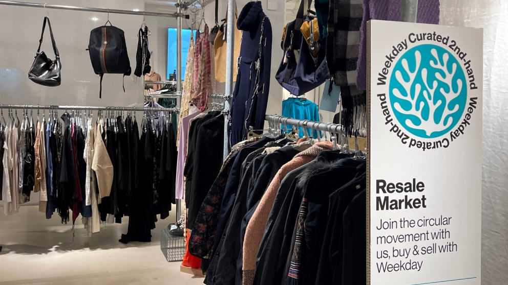 Resale market with clothes on rails