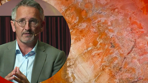 Person speaking on stage