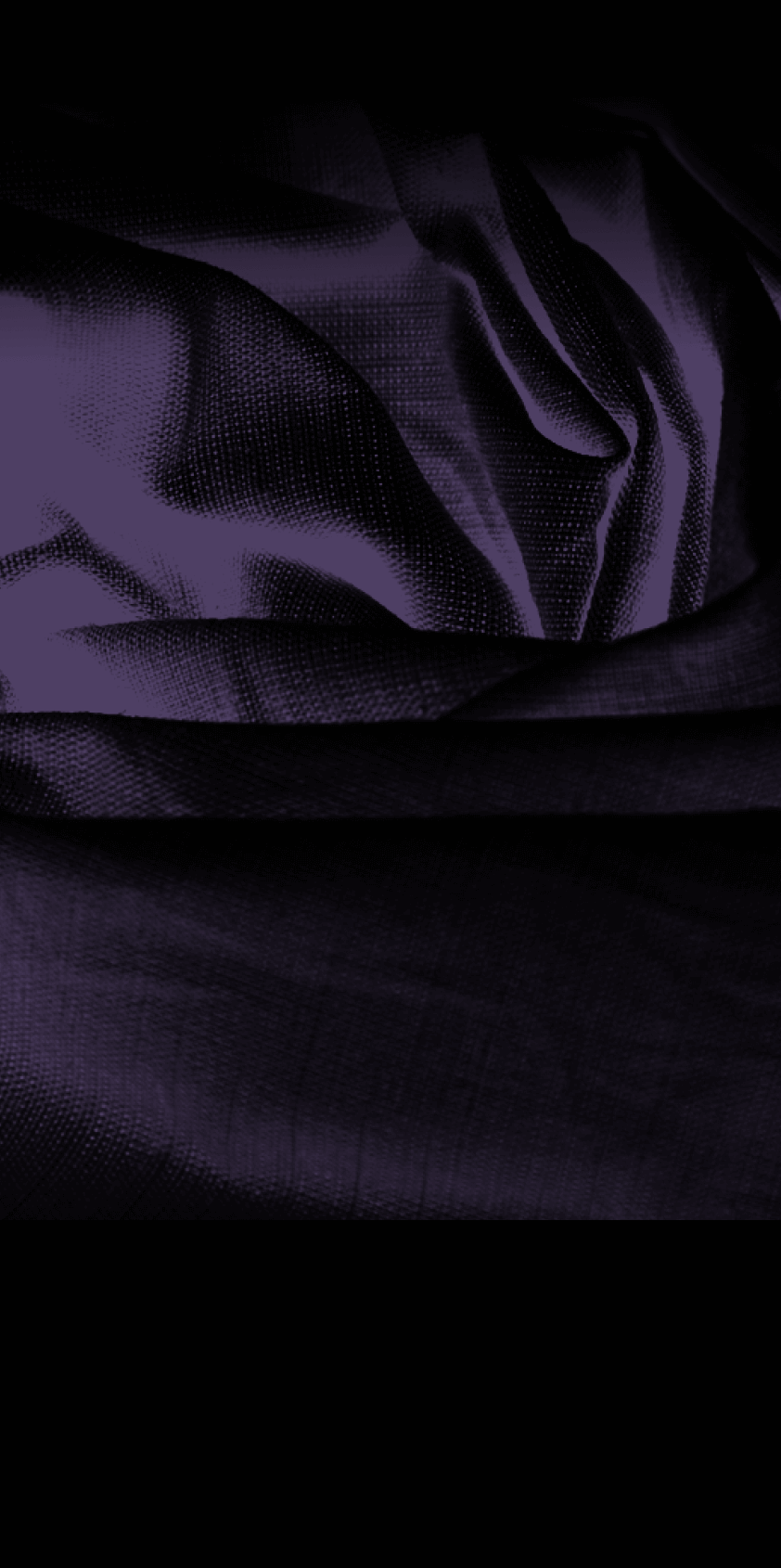 Picture of purple material fading into black