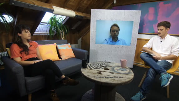 hosts on a set talking