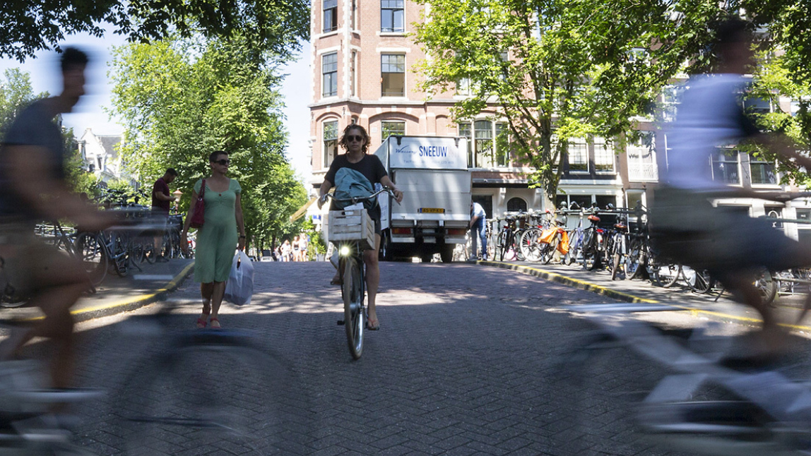 Photo of people riding bicycles