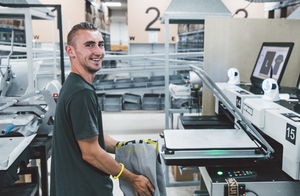 Man printing a t-shirt