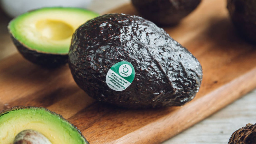 An avocado with an Apeel label.