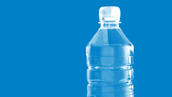 Plastic bottle on blue background