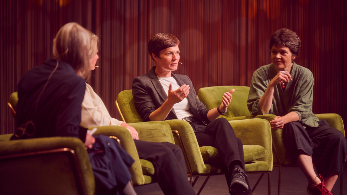 People talking on stage