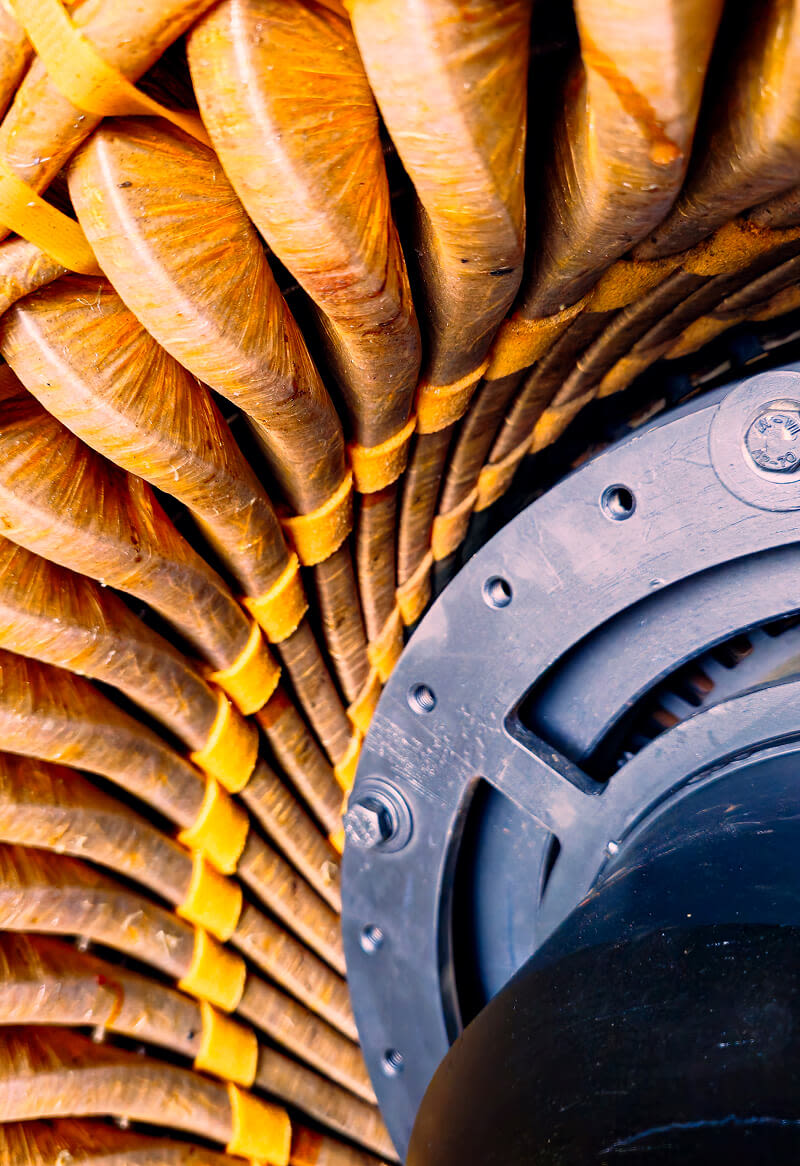 Close-up detail of copper windings inside a large industrial electric motor
