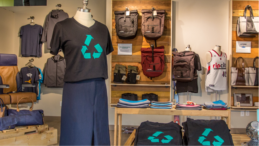 Interior of a shop showing t-shirts 