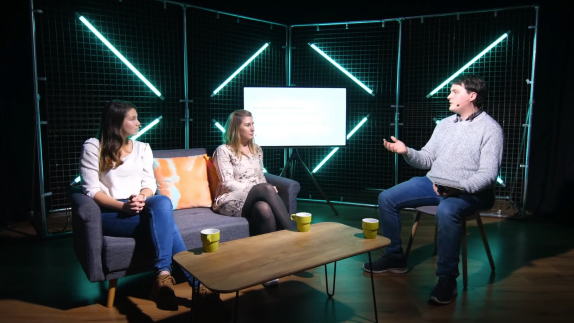 Host holding a discussion