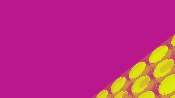 Abstract image of yellow dots on a pink background.