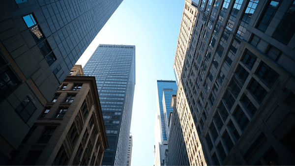 Looking up at skyscrapers