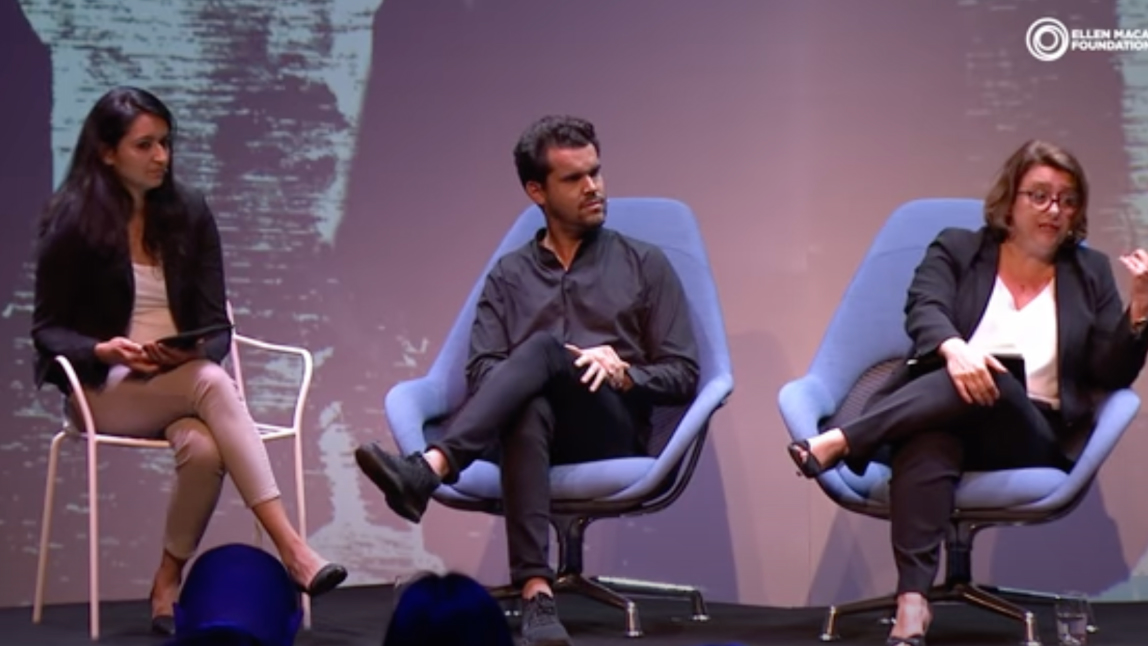 people discussing on stage