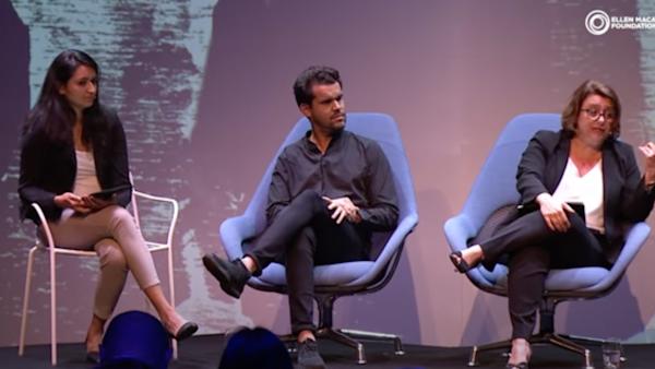 people discussing on stage