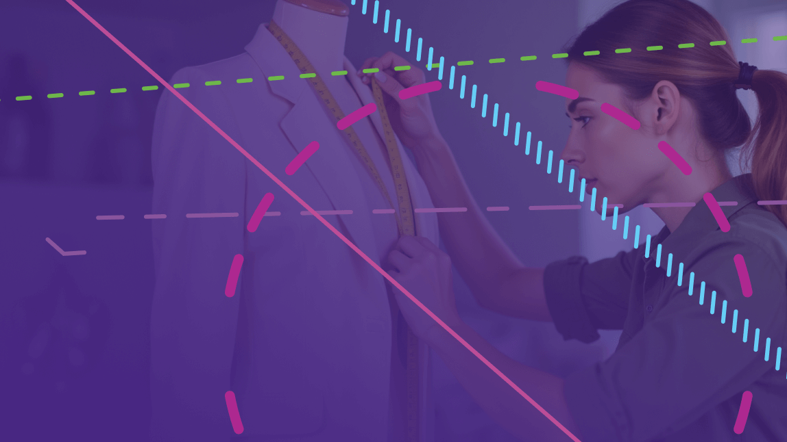 Woman measuring clothes as she is making them.