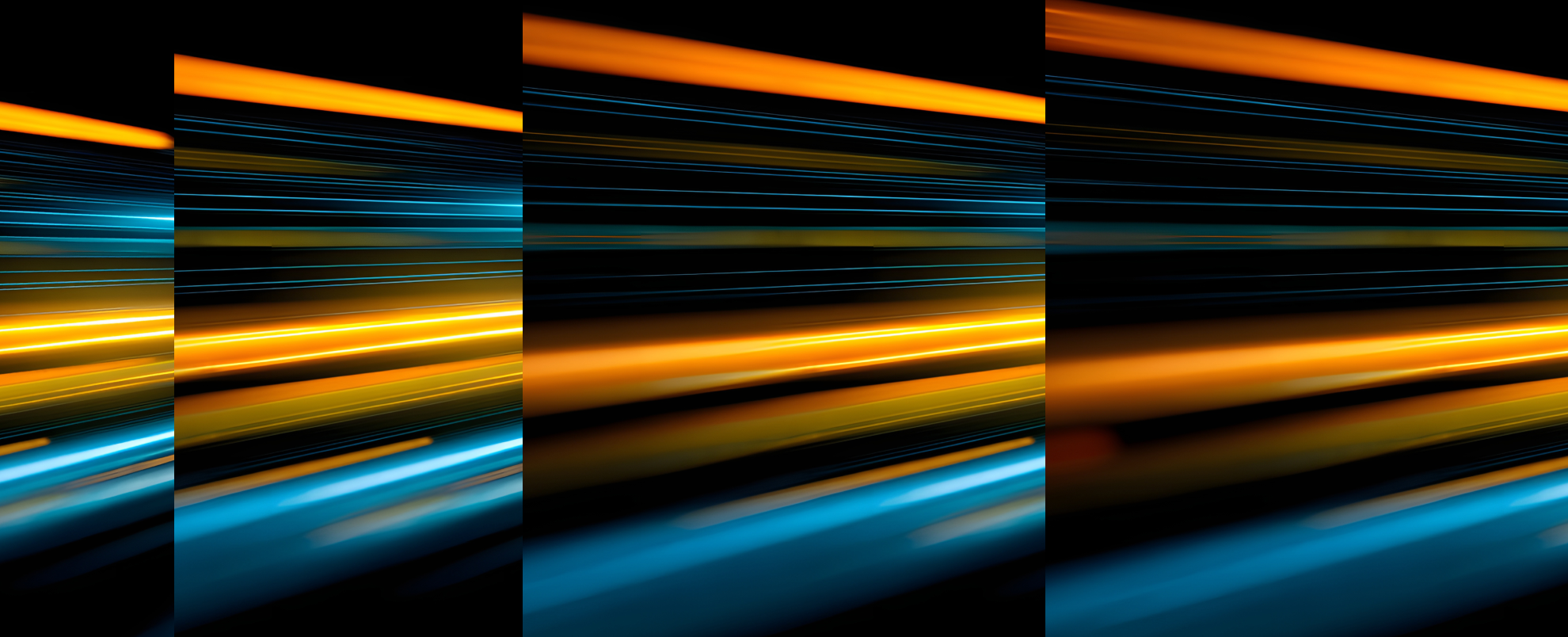 Bright speed lights, motion blur, left to right in yellows and blue on a black background