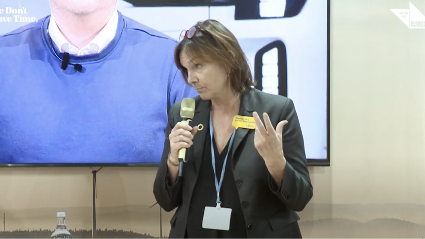 Person talking on stage