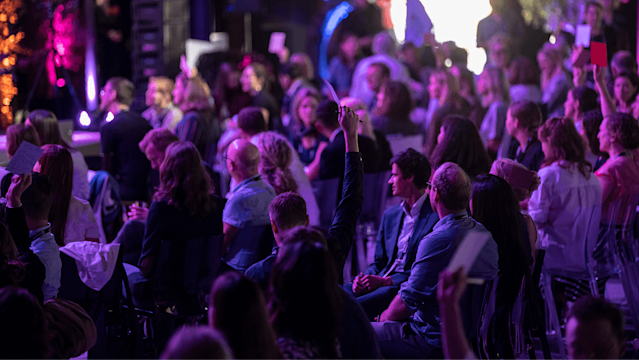 People collaborating at an event