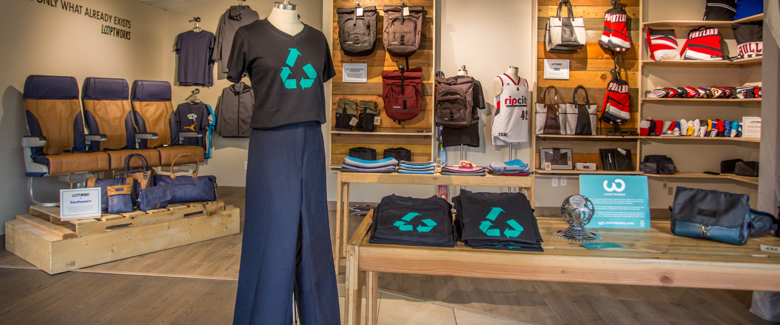 Interior of shop showing t-shirts