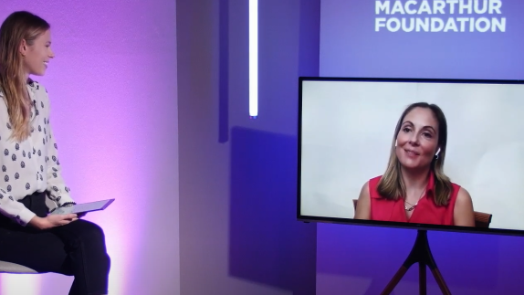 Host holding a discussion with guest