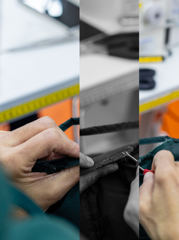 A person fixing a seam on a clothing item.
