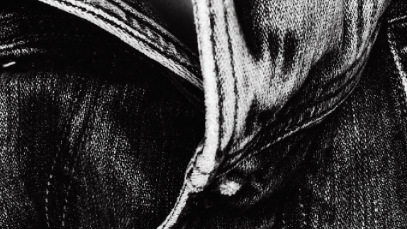 Black and white image of denim shirt