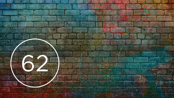 Brick wall with number '62'