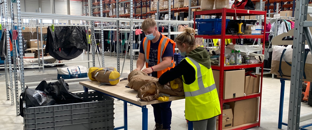 People in clothes factory