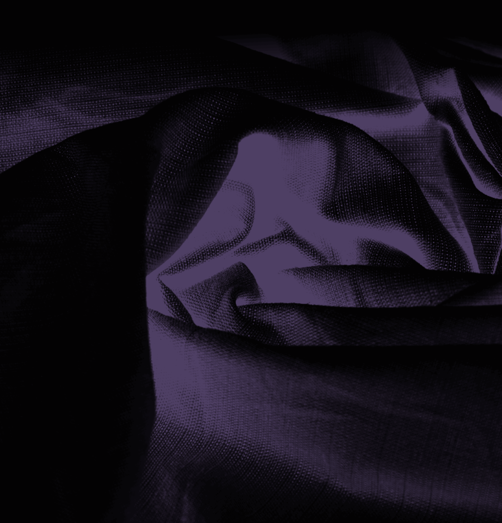 Picture of purple material fading into black