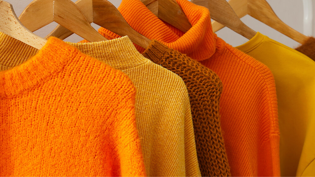 Close up of orange jumpers