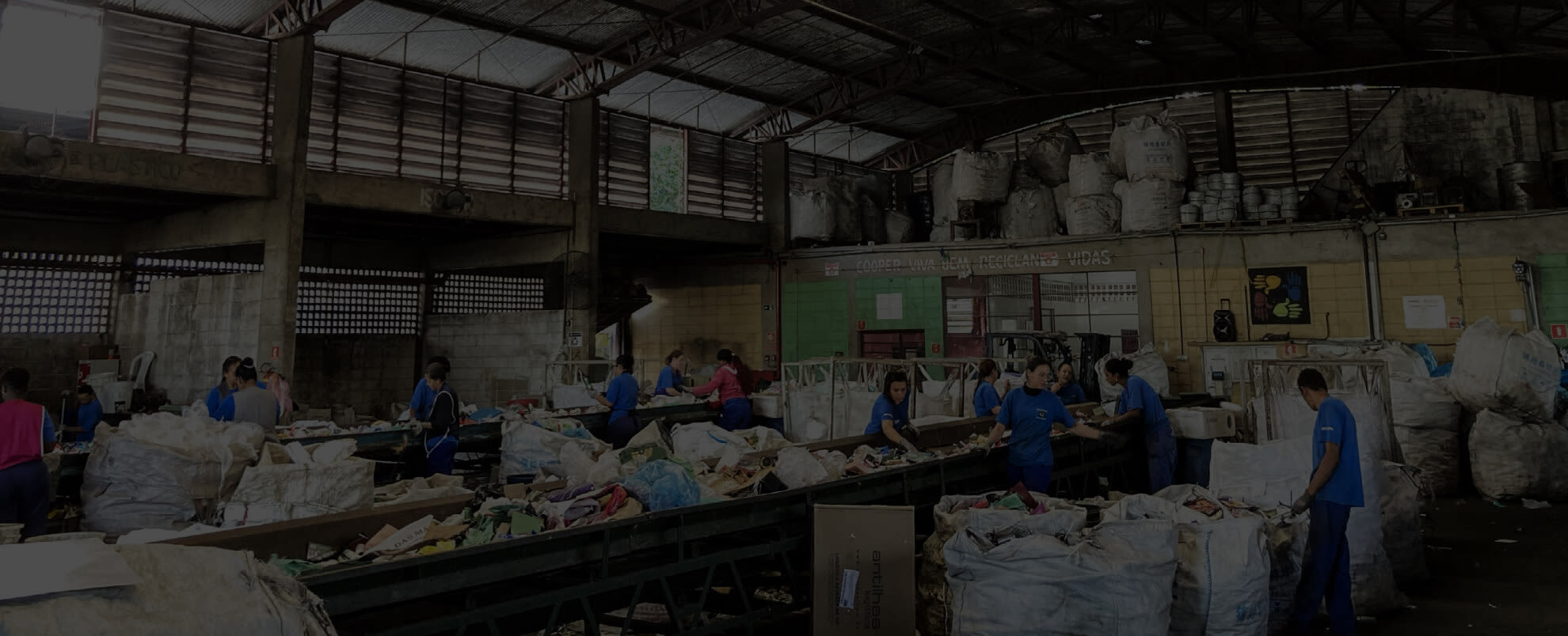 People sorting items for recycling
