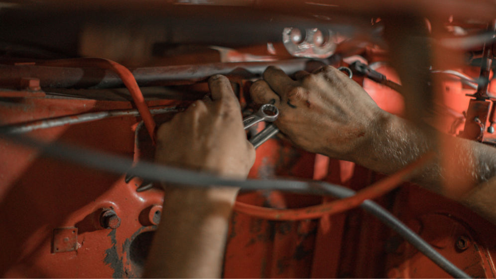 Person working on machinery