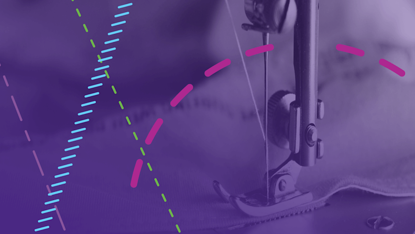 Sewing machine on purple background