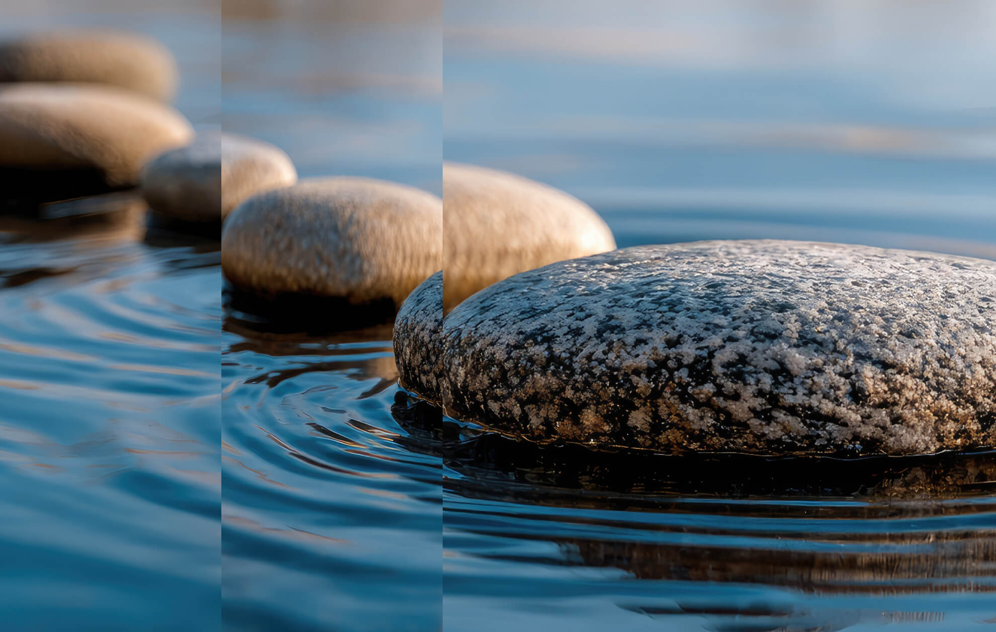 Rounded stones in water causing water ripples