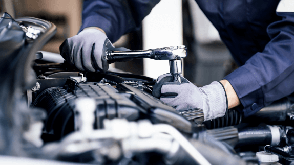 Mechanic working on vehicle 