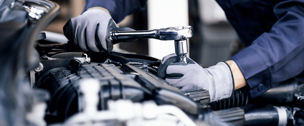 Mechanic working on vehicle