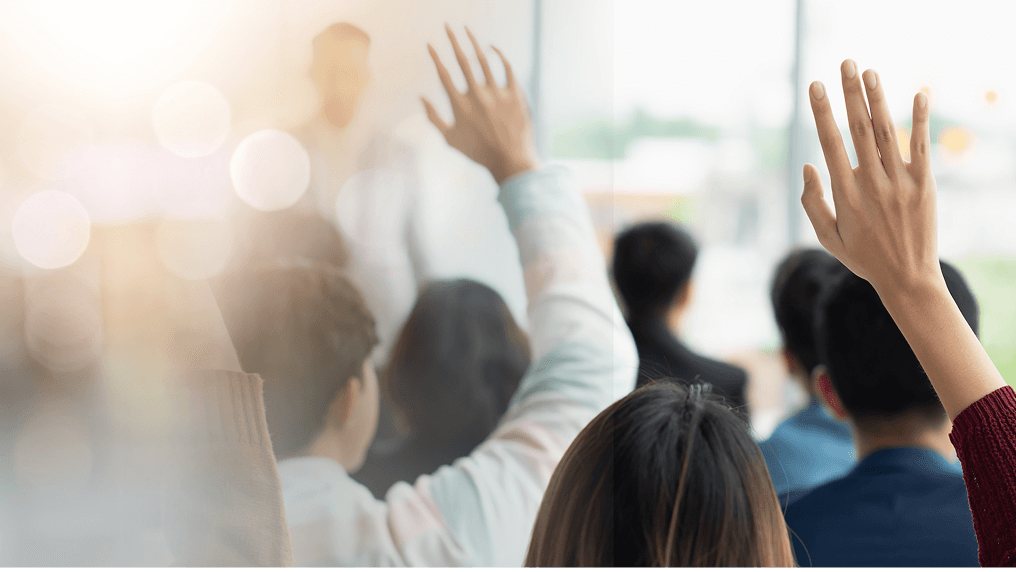 People with hands up