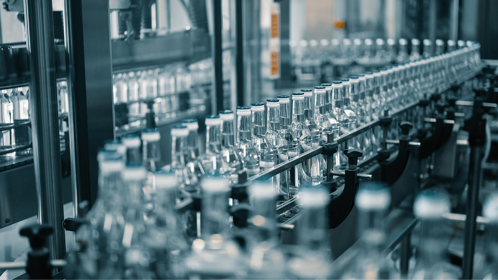 Glass bottles on a conveyor belt
