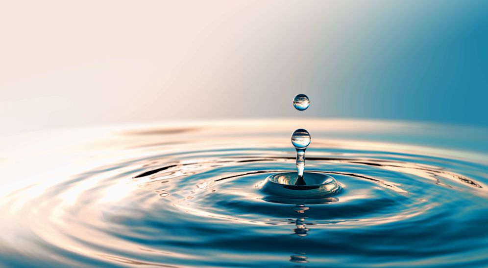 Image of a water making ringlets from a splash.