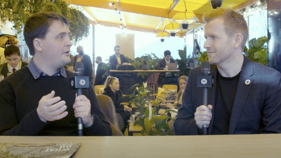 Two people talking with microphones