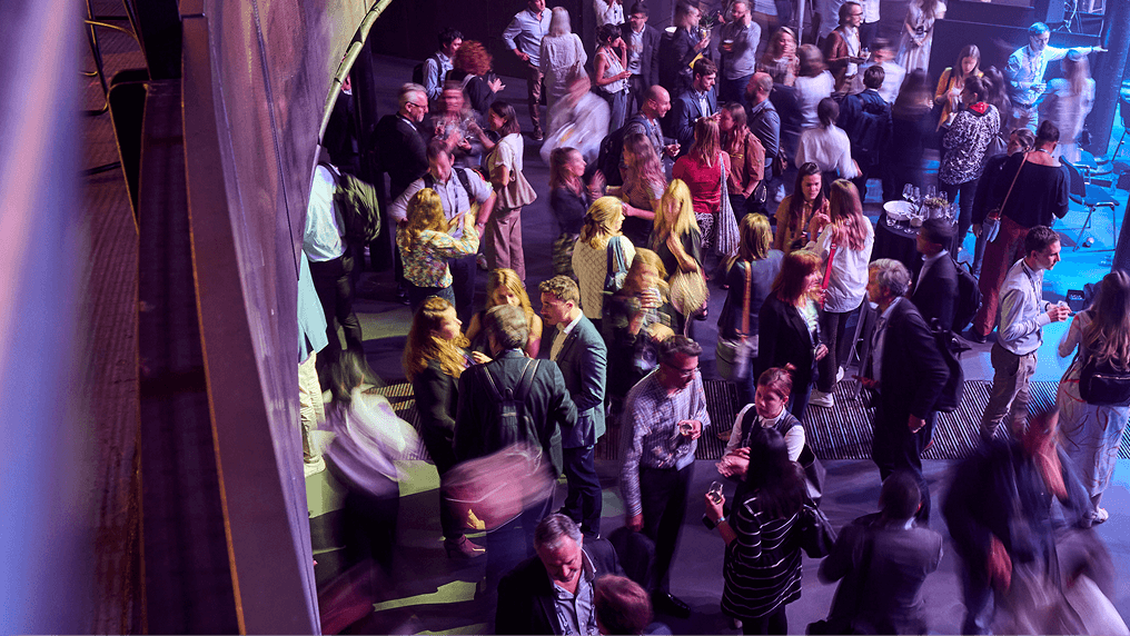 People networking at an Ellen MacArthur event